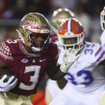 Florida State running back Trey Benson (3) runs for a touchdown in the first quarter of an NCAA college football game against Florida, Friday, Nov. 25, 2022, in Tallahassee, Fla. (AP Photo/Phil Sears)