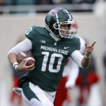 
              Michigan State quarterback Payton Thorne runs on a keeper against Rutgers during the first half of an NCAA college football game, Saturday, Nov. 12, 2022, in East Lansing, Mich. (AP Photo/Al Goldis)
            