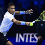 
              Felix Auger-Aliassime returns the ball to Rafael Nadal during their singles tennis match of the ATP World Tour Finals, at the Pala Alpitour in Turin, Italy, Tuesday, Nov. 15, 2022. (Nicolo' Campo/LaPresse via AP)
            