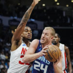 
              Charlotte Hornets center Mason Plumlee (24) works into the lane against Brooklyn Nets forward Nic Claxton, left, during the first half of an NBA basketball game, Saturday, Nov. 5, 2022, in Charlotte, N.C. (AP Photo/Rusty Jones)
            