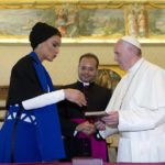 
              FILE - Pope Francis and Qatar's Sheikha Moza bint Nasser exchange gifts during a private audience at the Vatican, Saturday, June 4, 2016. The foreign fans descending on Doha for the 2022 FIFA World Cup will find a country where women work, hold public office and cruise in their supercars along the city's palm-lined corniche. (AP Photo/Alessandra Tarantino, File)
            