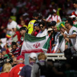 Iran's fans ahead of the World Cup group B soccer match between Wales and Iran, at the Ahmad Bin Ali Stadium in Al Rayyan, Qatar, Friday, Nov. 25, 2022. (AP Photo/Pavel Golovkin)