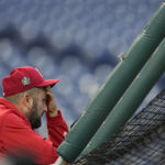 
              Philadelphia Phillies hitting coach Kevin Long watches during batting practice before Game 4 of baseball's World Series between the Houston Astros and the Philadelphia Phillies on Wednesday, Nov. 2, 2022, in Philadelphia. (AP Photo/David J. Phillip)
            