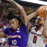 Texas Tech forward Kevin Obanor (0) attempts to shoot over Northwestern State guard Joshua Williams (10) during the first half of an NCAA college basketball game Monday, Nov. 7, 2022, in Lubbock, Texas. (AP Photo/Justin Rex)