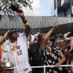 Houston Astros manager Dusty Baker (12) waves to fans during a victory parade for the Houston Astros' World Series baseball championship Monday, Nov. 7, 2022, in Houston. (AP Photo/David Phillip)