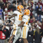 Tennessee tight end Princeton Fant (88) celebrates a touchdown with running back Jaylen Wright (20) during the second half of the team's NCAA college football game against South Carolina on Saturday, Nov. 19, 2022, in Columbia, S.C. (AP Photo/Artie Walker Jr.)