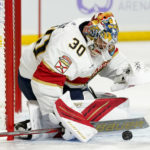 Florida Panthers goaltender Spencer Knight makes a save on a shot by the Arizona Coyotes during the first period of an NHL hockey game in Tempe, Ariz., Tuesday, Nov. 1, 2022. (AP Photo/Ross D. Franklin)