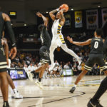 
              Virginia Commonwealth guard Ace Baldwin (1) is defended by Vanderbilt guard Ezra Manjon (5) during the first half of an NCAA college basketball game Wednesday, Nov. 30, 2022, in Richmond, Va. (Shaban Athuman/Richmond Times-Dispatch via AP)
            