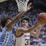 
              Indiana's Trey Galloway (32) shoots against North Carolina's Seth Trimble during the second half of an NCAA college basketball game, Wednesday, Nov. 30, 2022, in Bloomington, Ind. (AP Photo/Darron Cummings)
            