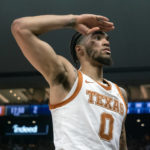 
              Texas forward Timmy Allen salutes the crowd after making a basket during the first half the team's NCAA college basketball game against UTEP, Monday, Nov. 7, 2022, in Austin, Texas. (AP Photo/Michael Thomas)
            