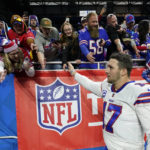 Buffalo Bills quarterback Josh Allen greets fans after an NFL football game against the Detroit Lions, Thursday, Nov. 24, 2022, in Detroit. (AP Photo/Paul Sancya)