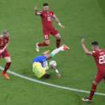 
              Brazil's Neymar centrer lies on the pitch after he was fouled by Serbia's Strahinja Pavlovic , left, during the World Cup group G soccer match between Brazil and Serbia, at the the Lusail Stadium in Lusail, Qatar on Thursday, Nov. 24, 2022. (AP Photo/Darko Vojinovic)
            