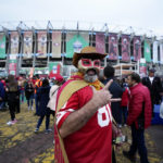 A San Francisco 49ers fan wears a Mexican wrestling mask before an NFL football game between the Arizona Cardinals and the San Francisco 49ers Monday, Nov. 21, 2022, in Mexico City. (AP Photo/Fernando Llano)