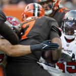 Tampa Bay Buccaneers linebacker Devin White (45) sacks Cleveland Browns quarterback Jacoby Brissett (7) during the second half of an NFL football game in Cleveland, Sunday, Nov. 27, 2022. (AP Photo/Ron Schwane)