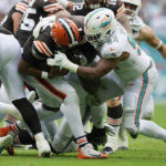 
              Miami Dolphins defensive tackle Christian Wilkins (94) sacks Cleveland Browns quarterback Jacoby Brissett (7) during the first half of an NFL football game, Sunday, Nov. 13, 2022, in Miami Gardens, Fla. (AP Photo/Wilfredo Lee)
            