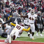 Arizona State defensive back Ed Woods (10) deflects a pass intended for Washington State wide receiver Tsion Nunnally during the first half of an NCAA college football game, Saturday, Nov. 12, 2022, in Pullman, Wash. (AP Photo/Young Kwak)