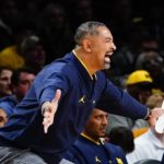 Michigan head coach Juwan Howard calls out to his team during the first half of an NCAA college basketball game against Arizona State in the championship round of the Legends Classic Thursday, Nov. 17, 2022, in New York. (AP Photo/Frank Franklin II)