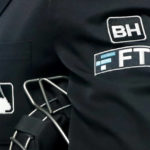 
              File - The FTX logo appears on home plate umpire Jansen Visconti's jacket at a baseball game with the Minnesota Twins on Tuesday, Sept. 27, 2022, in Minneapolis. Embattled cryptocurrency exchange FTX, short billions of dollars, is seeking bankruptcy protection, Friday, Nov. 11,  following its collapse this week.  (AP Photo/Bruce Kluckhohn, File)
            