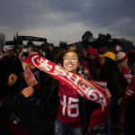 Fans react before an NFL football game between the Arizona Cardinals and the San Francisco 49ers Monday, Nov. 21, 2022, in Mexico City. (AP Photo/Fernando Llano)