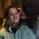 
              Saskia Niño de Rivera, right, a Mexican civil rights activist, and her girlfriend Mariel Duayhe, a sports agent for Mexican soccer players, pose for a photo at their apartment in Mexico City, Tuesday, Nov. 8, 2022. Saskia Niño de Rivera contemplated privately proposing in Qatar at the World Cup during a game, but as the lesbian couple learned more about laws against same-sex relations in the conservative Gulf country, she decided against the idea. (AP Photo/Fernando Llano)
            