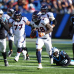 
              Denver Broncos running back Latavius Murray runs during the first half of an NFL football game between the Carolina Panthers and the Denver Broncos on Sunday, Nov. 27, 2022, in Charlotte, N.C. (AP Photo/Jacob Kupferman)
            
