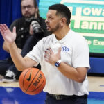 The ball is thrown past Pittsburgh head coach Jeff Capel as he gestures during the second half of an NCAA college basketball game against West Virginia, Friday, Nov. 11, 2022, in Pittsburgh. (AP Photo/Keith Srakocic)