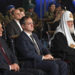 
              From left, Sergei Naryshkin, head of the Russian Foreign Intelligence Service, Russian presidential Aide and the head of the Russian delegation Vladimir Medinsky and Russian Orthodox Church Patriarch Kirill listens to Russian President Vladimir Putin's speech during a meeting with historians and representatives of traditional religions of Russia marking the 10th anniversary of the re-establishment of the Russian Historical and Russian Military Historical Societies during National Unity Day in Moscow, Russia, Friday, Nov. 4, 2022. (Grigory Sysoyev, Sputnik, Kremlin Pool Photo via AP)
            