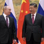 
              FILE - Chinese President Xi Jinping, right, and Russian President Vladimir Putin talk to each other during their meeting in Beijing, Friday, Feb. 4, 2022. The two leaders used the occasion of the Winter Olympics in Beijing to hold a summit and show solidarity. (Alexei Druzhinin, Sputnik, Kremlin Pool Photo via AP, File)
            