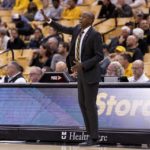 Missouri head coach Dennis Gates positions his players during the first half of an NCAA college basketball game against Southern Indiana Saturday, Nov. 7, 2022, in Columbia, Mo. Missouri won 97-91. (AP Photo/L.G. Patterson)