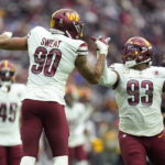 
              Washington Commanders defensive end Montez Sweat (90) and defensive tackle Jonathan Allen (93) celebrate a sack during the first half of an NFL football game against the Houston Texans Sunday, Nov. 20, 2022, in Houston. (AP Photo/Eric Christian Smith)
            