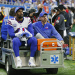 
              Buffalo Bills linebacker Von Miller (40) is carted off the field during the first half of an NFL football game against the Detroit Lions, Thursday, Nov. 24, 2022, in Detroit. (AP Photo/Duane Burleson)
            