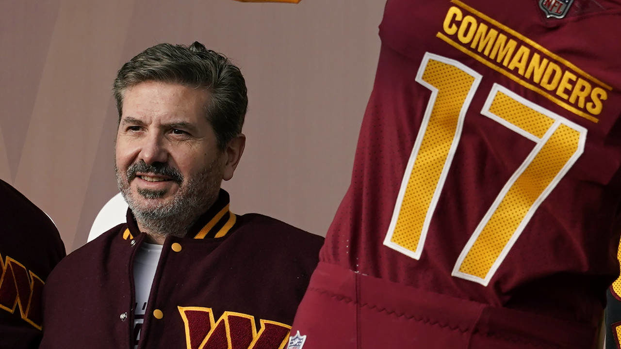 Washington Commanders' Dan Snyder poses for photos during an event to unveil the NFL football team'...