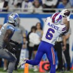 Buffalo Bills wide receiver Isaiah McKenzie (6), defended by Detroit Lions safety Will Harris (25) catches a 19-yard pass for a touchdown during the first half of an NFL football game, Thursday, Nov. 24, 2022, in Detroit. (AP Photo/Paul Sancya)