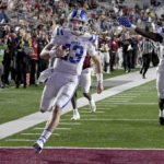 Duke quarterback Riley Leonard (13) runs into the end zone to score during the first half of an NCAA college football game against Boston College, Friday, Nov. 4, 2022 in Boston. (AP Photo/Mark Stockwell)
