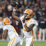 Tennessee quarterback Hendon Hooker (5) throws a short pass during the first half of the team's NCAA college football game against South Carolina on Saturday, Nov. 19, 2022, in Columbia, S.C. (AP Photo/Artie Walker Jr.)
