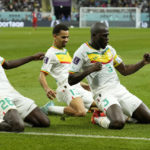 
              Senegal's Kalidou Koulibaly, right, celebrates with teammates scoring his side's second goal during the World Cup group A soccer match between Ecuador and Senegal, at the Khalifa International Stadium in Doha, Qatar, Tuesday, Nov. 29, 2022. (AP Photo/Francisco Seco)
            