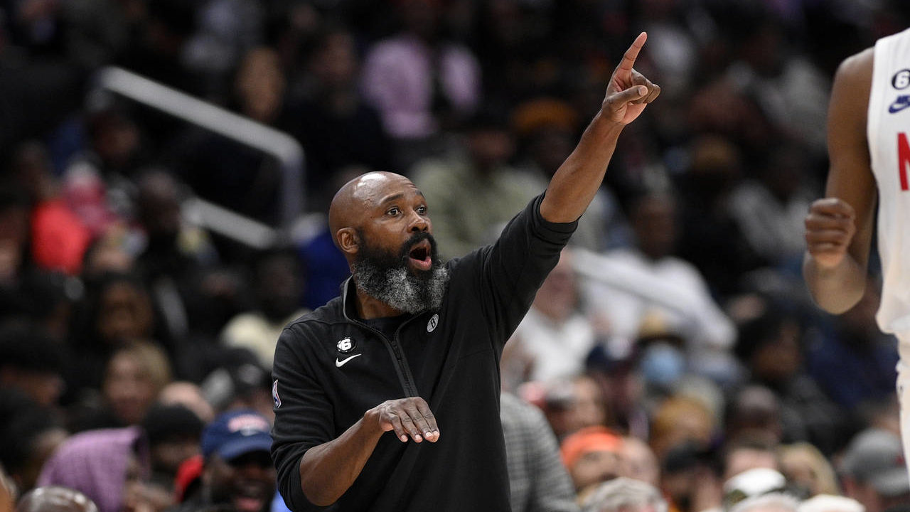 Brooklyn Nets acting head coach Jacque Vaughn points during the second half of an NBA basketball ga...