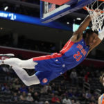 Detroit Pistons guard Jaden Ivey (23) dunks during the second half of an NBA basketball game against the Oklahoma City Thunder, Monday, Nov. 7, 2022, in Detroit. (AP Photo/Carlos Osorio)