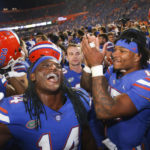 Florida linebacker Chief Borders (14) and quarterback Anthony Richardson (15) celebrate after an NCAA college football game against South Carolina, Saturday, Nov. 12, 2022, in Gainesville, Fla. (AP Photo/Matt Stamey)