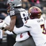 Washington State wide receiver De'Zhaun Stribling (88) catches a pass while defended by Arizona State defensive back D.J. Taylor (3) during the first half of an NCAA college football game, Saturday, Nov. 12, 2022, in Pullman, Wash. (AP Photo/Young Kwak)