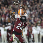 South Carolina defensive back Marcellas Dial Jr. (24) breaks up a pass to Tennessee wide receiver Cedric Tillman (4) during the second half of an NCAA college football game Saturday, Nov. 19, 2022, in Columbia, S.C. (AP Photo/Artie Walker Jr.)