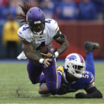 Minnesota Vikings running back Dalvin Cook (4) is brought down by Buffalo Bills linebacker Tyrel Dodson (53) in the first half of an NFL football game, Sunday, Nov. 13, 2022, in Orchard Park, N.Y. (AP Photo/Joshua Bessex)