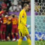 
              Germany's goalkeeper Manuel Neuer reacts after Spain's Alvaro Morata scored his side's opening goal during the World Cup group E soccer match between Spain and Germany, at the Al Bayt Stadium in Al Khor , Qatar, Sunday, Nov. 27, 2022. (AP Photo/Julio Cortez)
            