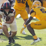 Oregon State running back Kanoa Shannon (29) runs with the ball as he tries to elude Arizona State defensive back Chris Edmonds (5) during the second half of an NCAA college football game in Tempe, Ariz., Saturday, Nov. 19, 2022. Oregon State won 31-7. (AP Photo/Ross D. Franklin)