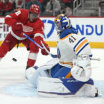 Buffalo Sabres goaltender Craig Anderson (41) stops a Detroit Red Wings center Andrew Copp (18) shot in the first period of an NHL hockey game Wednesday, Nov. 30, 2022, in Detroit. (AP Photo/Paul Sancya)