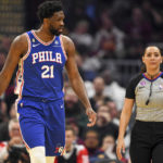 
              Philadelphia 76ers center Joel Embiid (21) argues with referee Ashley Moyer-Gleich during the first half of an NBA basketball game against the Cleveland Cavaliers, Wednesday, Nov. 30, 2022, in Cleveland. (AP Photo/Nick Cammett)
            