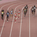 
              FILE - Competitors race in a women's 4x100 meter relay semifinal at the World Athletics Championships in Doha, Qatar, Friday, Oct. 4, 2019. The World Cup is just one way Qatar is using its massive wealth to project influence. By buying sports teams, hosting high-profile events, and investing billions in European capitals — such as buying London’s The Shard skyscraper — Qatar has been integrating itself into international finance and a network of support.     (AP Photo/Nariman El-Mofty, File)
            