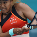 
              File - The FTX logo appears on Naomi Osaka's outfit during the Miami Open tennis tournament, April 2, 2022, in Miami Gardens, Fla. A host of Hollywood and sports celebrities including Larry David and Tom Brady were named as defendants in a class-action lawsuit against cryptocurrency exchange FTX, arguing that their celebrity status made them culpable for promoting the firm's failed business model. (AP Photo/Wilfredo Lee, File)
            