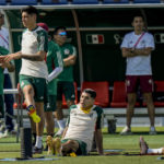 Edson Alvarez, left, stretches during Mexico official training on the eve of the group C World Cup soccer match between Saudi Arabia and Mexico, in Jor , Qatar, Tuesday, Nov. 29, 2022. (AP Photo/Moises Castillo)