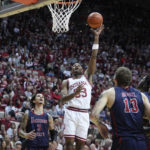 
              Indiana guard Tamar Bates (53) shoots during the second half of an NCAA college basketball game against Jackson State, Friday, Nov. 25, 2022, in Bloomington, Ind. (AP Photo/Darron Cummings)
            